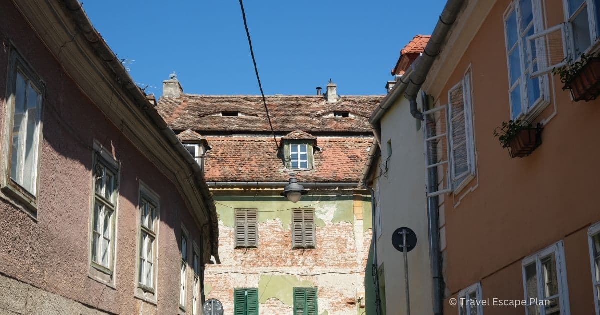attic windows on the rooftop of a house in Sibiu which resembles a pair of eyes