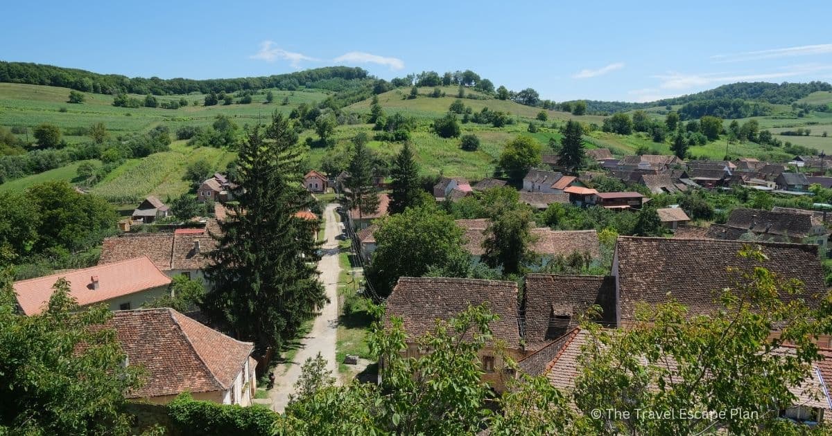 view of the green landscape and houses surrounding Biertan from the fortified church on a hill