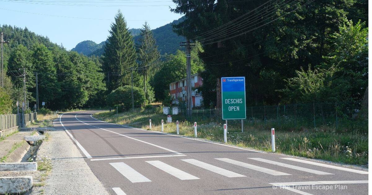 the start of the Transfagarasan Highway featuring pedestrian crossing and open sign